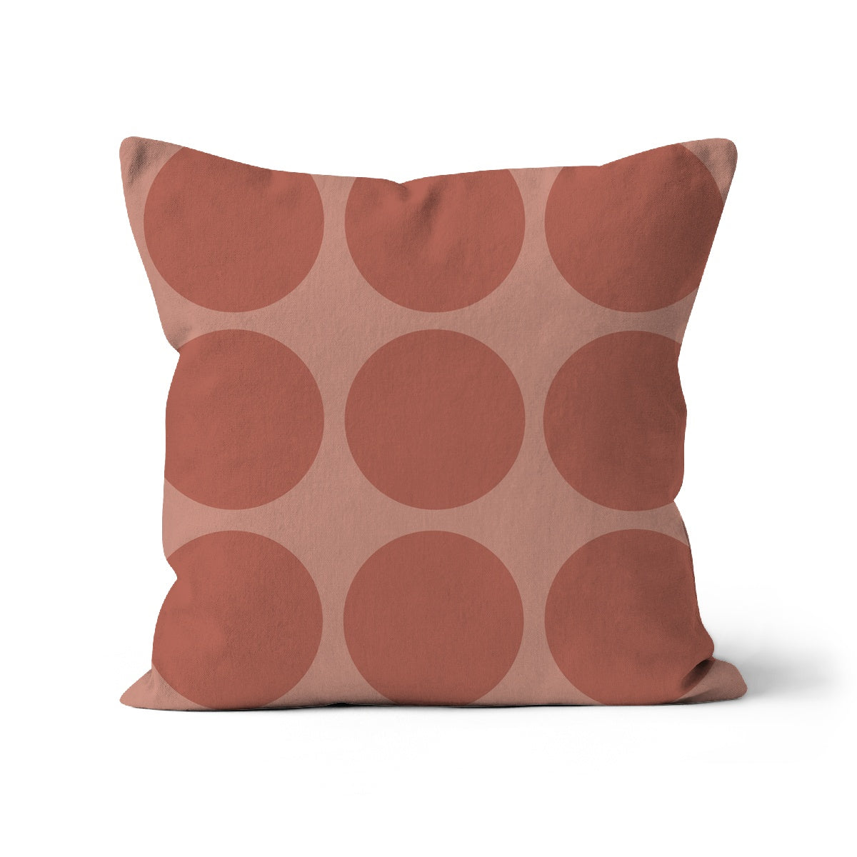 Square shaped cushion with a big spotty pattern in Nude and terracotta colours, neutral spotty cushion cover in organic cotton, sqaure pink cushion cover.