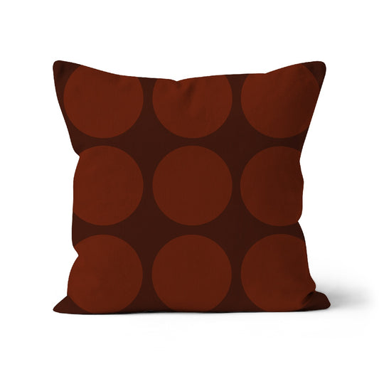 Square shaped cushion with a big spotty pattern in cocoa and dark espresso brown colour