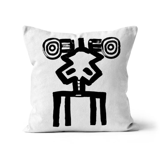 Cushion with primitive ink drawing of a grasshopper face against a white background