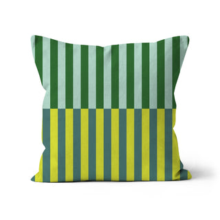 Striped pillow with green and yellow pattern on a white background