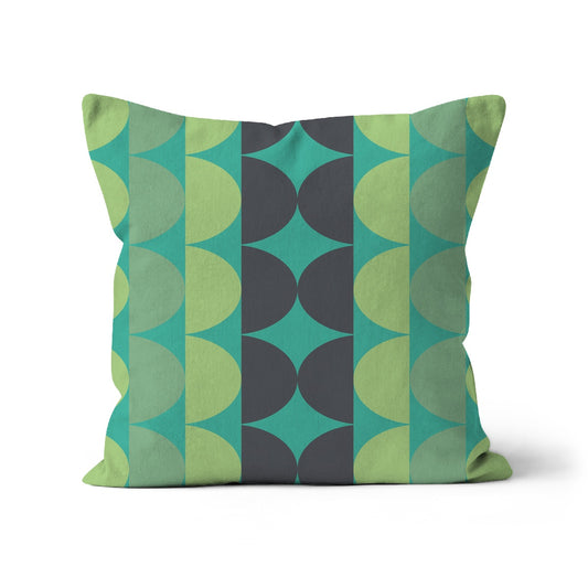 Square shaped cushion with Bauhaus style pattern in greens and grey colour combination.