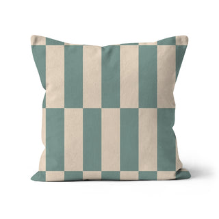 Checkered pillow with green and beige pattern on a white background
