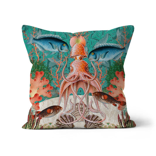 Square shaped cushion with aquatic image featuring fish, octopus, coral and shells in blue green and coral pink colorway
