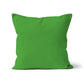 Bright green colour cotton cushion cover. Spring green cushion cover. Bright green pillow cover. Organic cotton. Square cushion cover. Unfilled cushion. Organic cotton cushion. Made in the UK. British-Made. Sustainable homeware. Plain cushion covers. Eco-friendly cushion. High-quality cushion covers. Machine washable cushion covers. Plain colour cushion covers.