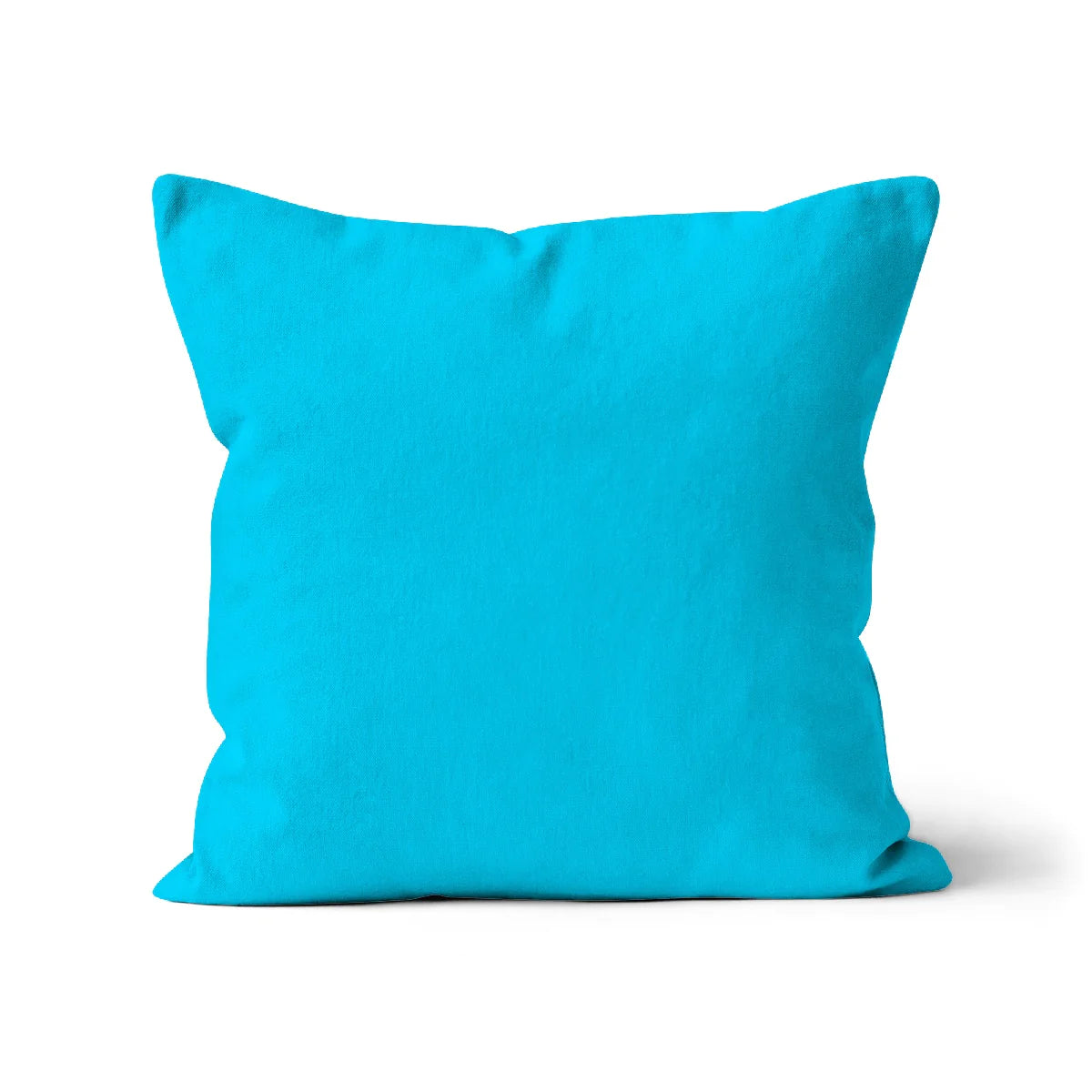 Bright blue cotton cushion cover. Cyan Blue cushion cover. Cyan pillow cover. Organic cotton. Square cushion cover. Unfilled cushion. Organic cotton cushion. Made in the UK. British-Made. Sustainable homeware. Plain cushion covers. Eco-friendly cushion. High-quality cushion covers. Machine washable cushion covers. Plain colour cushion covers.